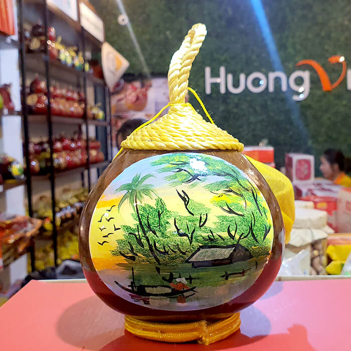 Rượu dừa Bến Tre tranh vẽ miền tây 650ml Rượu dừa Bến Tre tranh vẽ miền tây 650ml